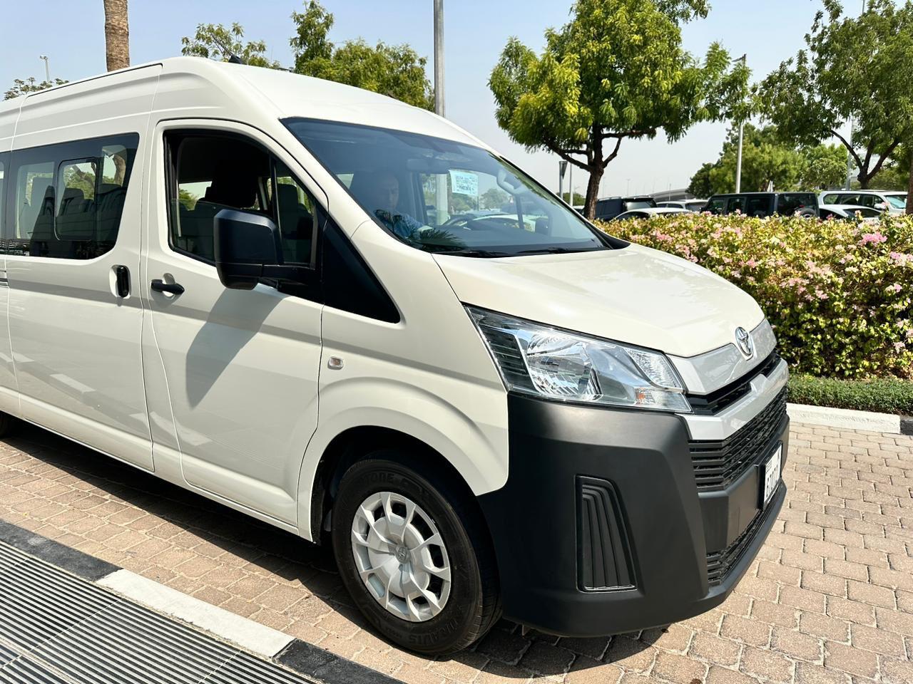 Toyota Hiace 14 seater van front view in white color